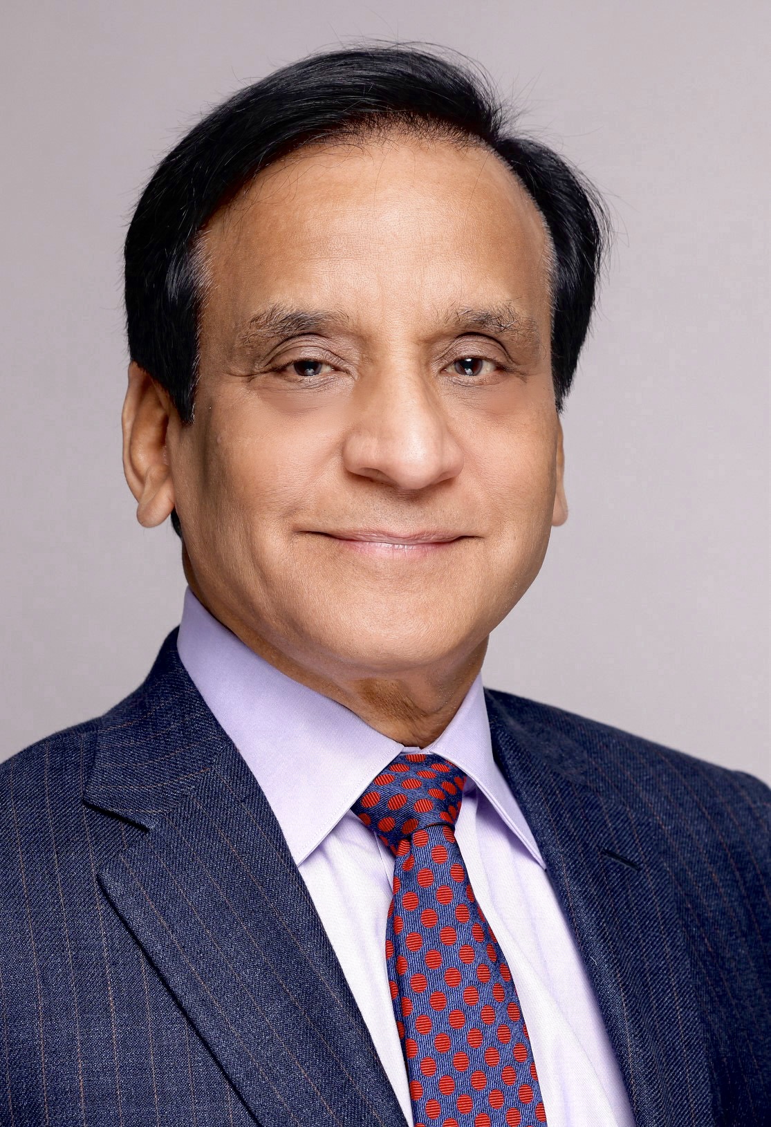 Dr. Samin K. Sharma